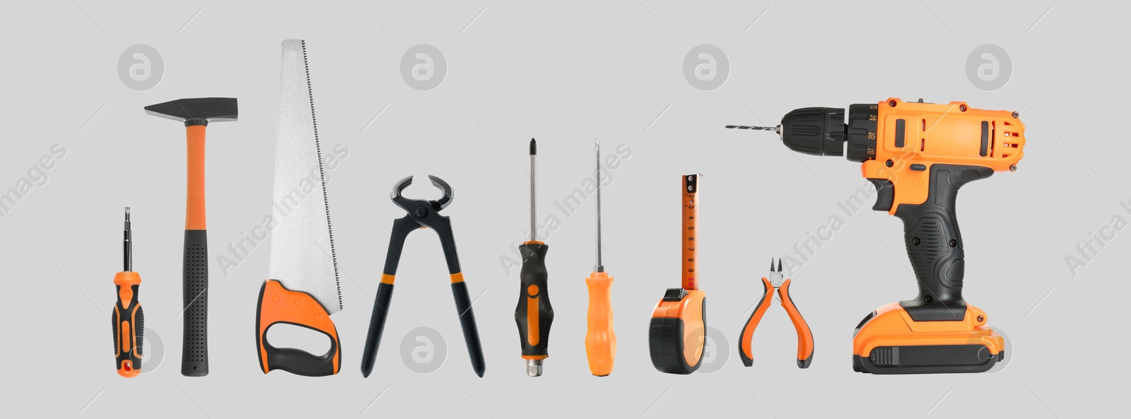 Image of Set of different construction tools on light grey background, Banner design