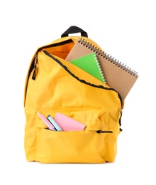 Photo of Backpack with different school stationery isolated on white