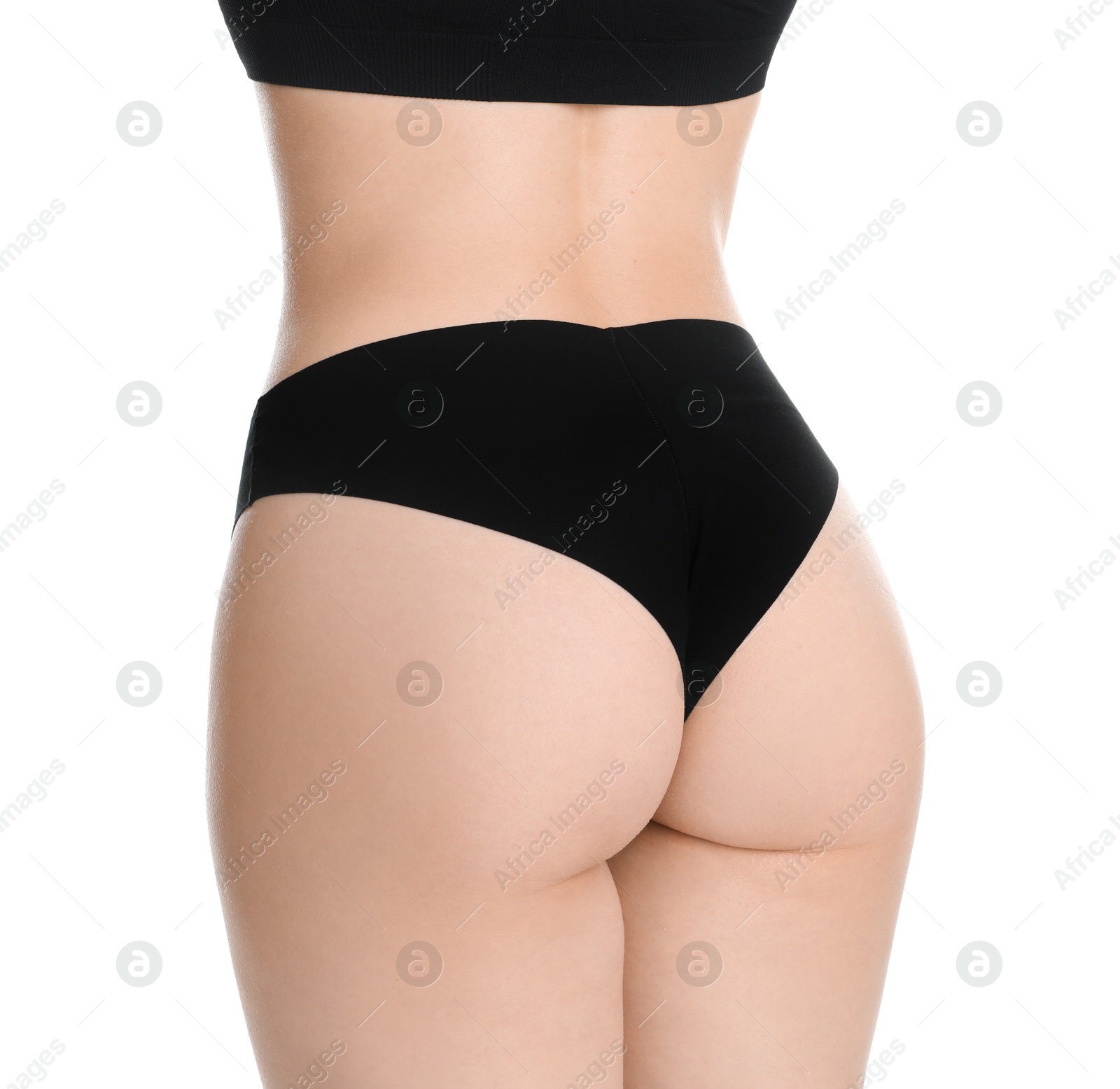 Photo of Woman with slim body posing on white background, closeup