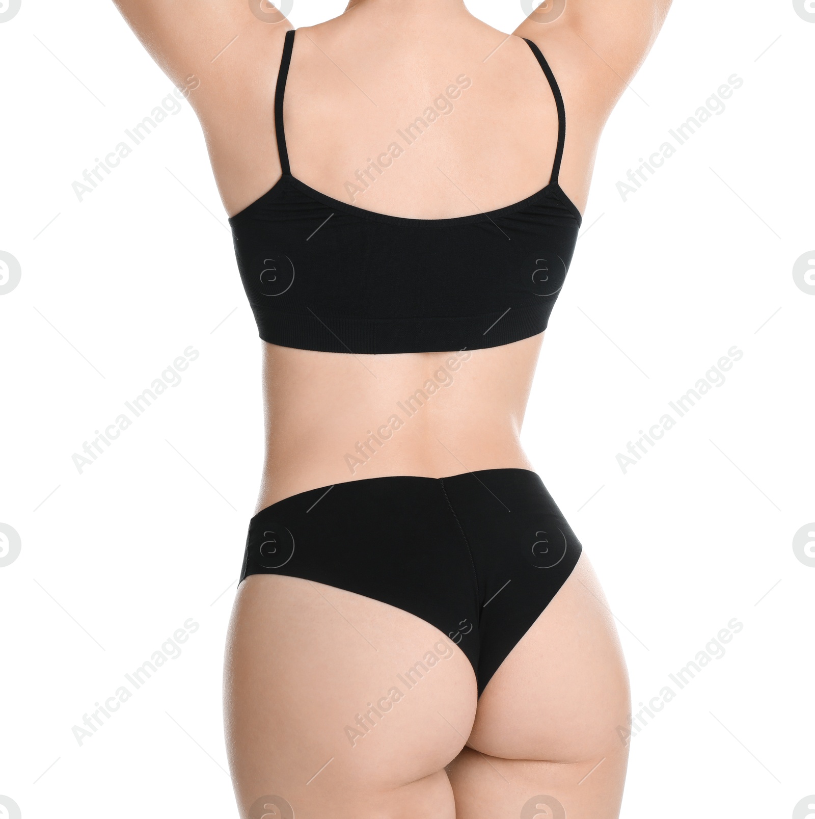 Photo of Woman with slim body posing on white background, closeup