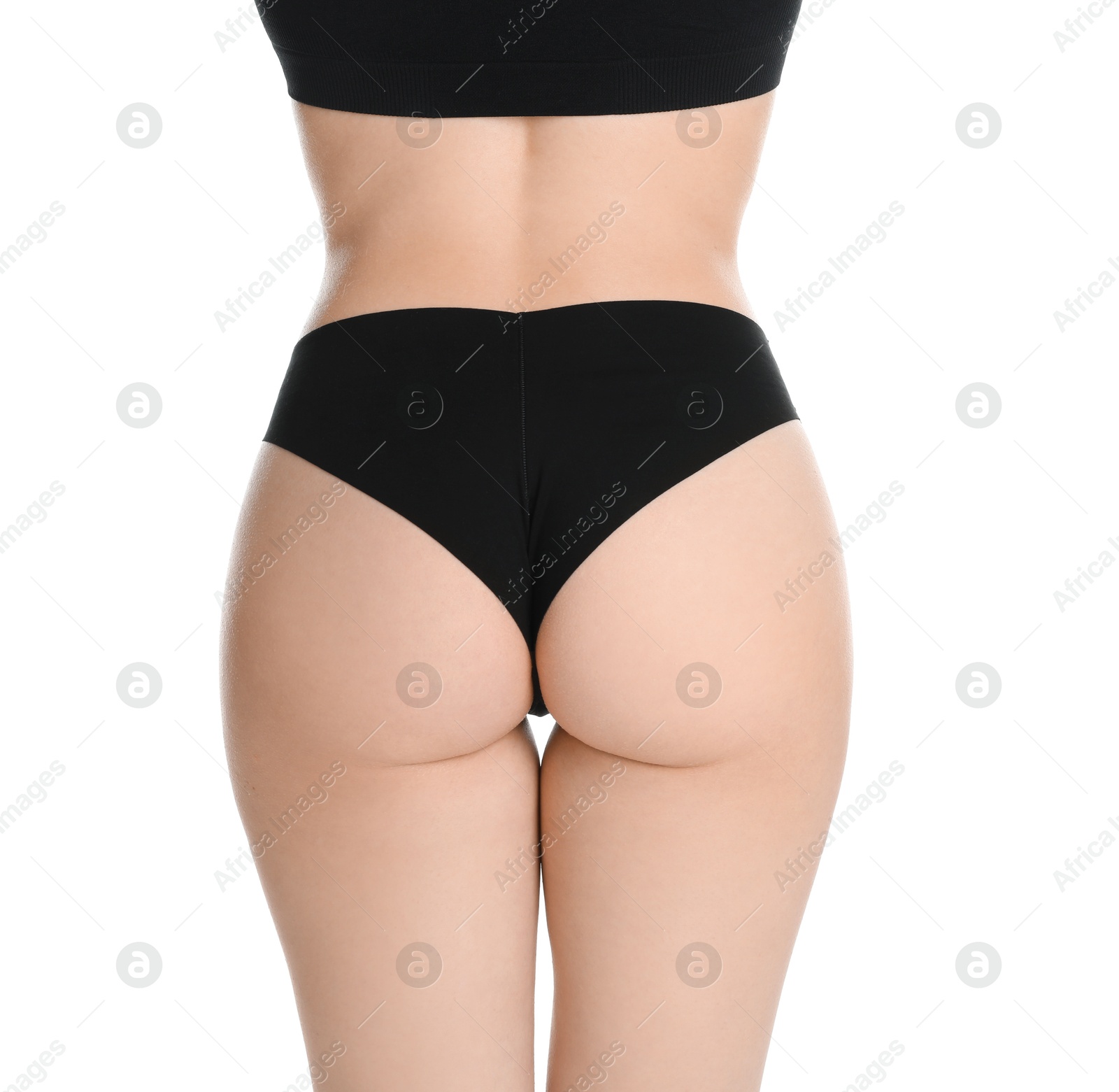 Photo of Woman with slim body posing on white background, closeup