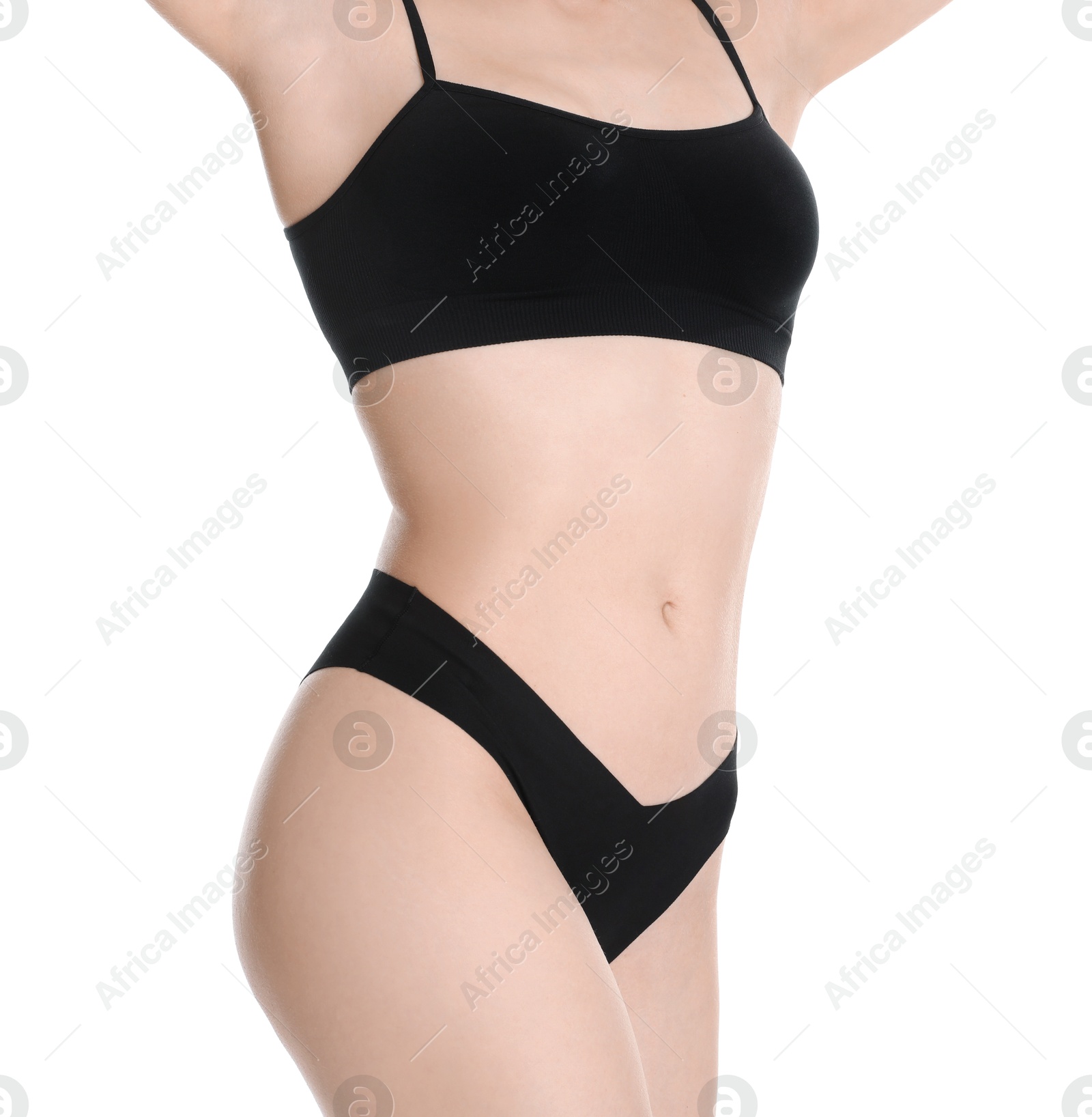 Photo of Woman with slim body posing on white background, closeup