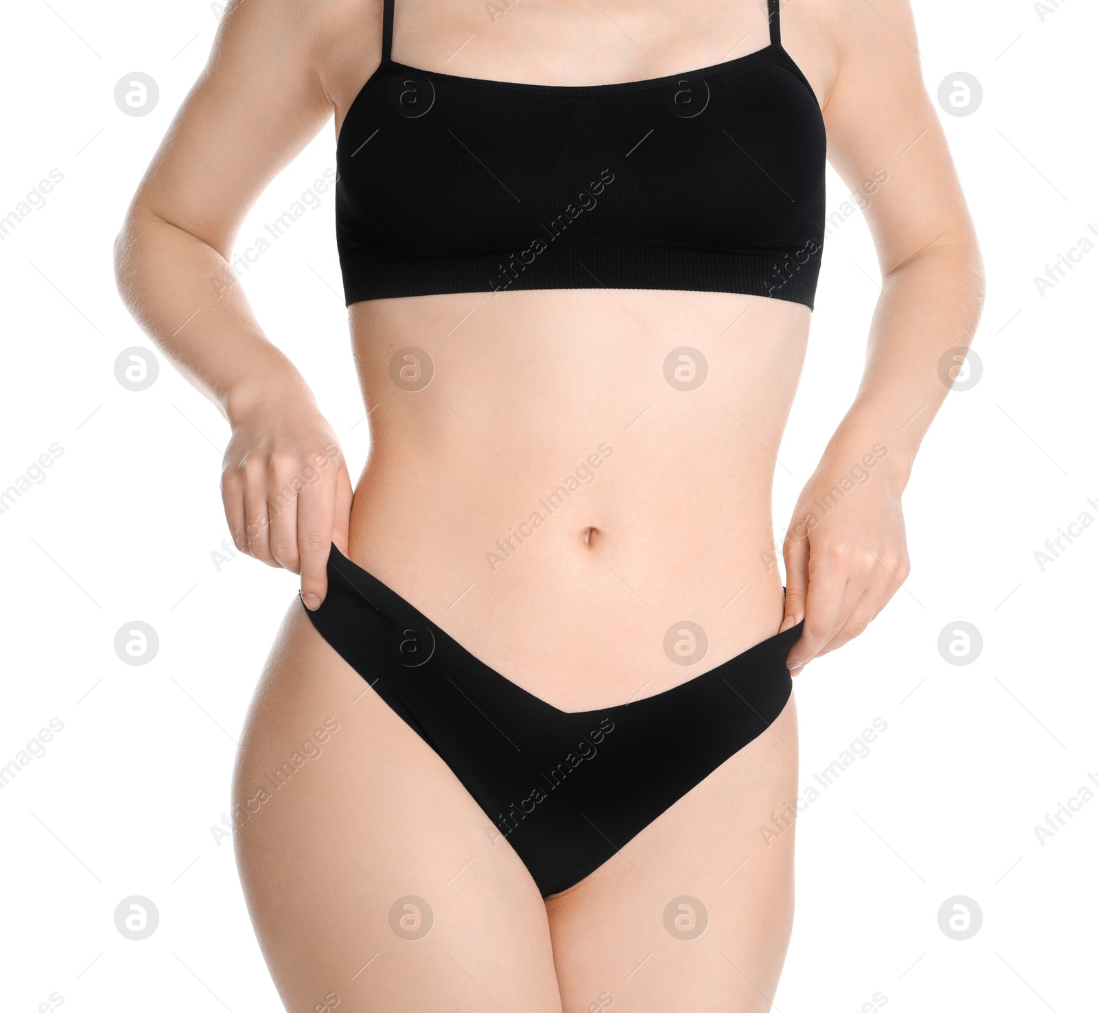 Photo of Woman with slim body posing on white background, closeup