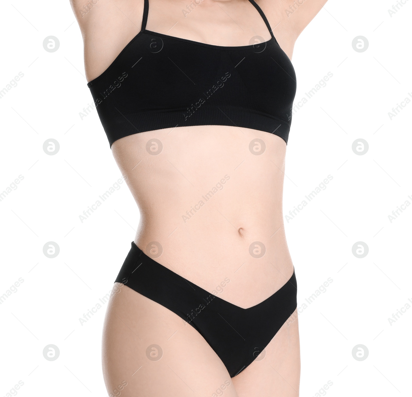 Photo of Woman with slim body posing on white background, closeup