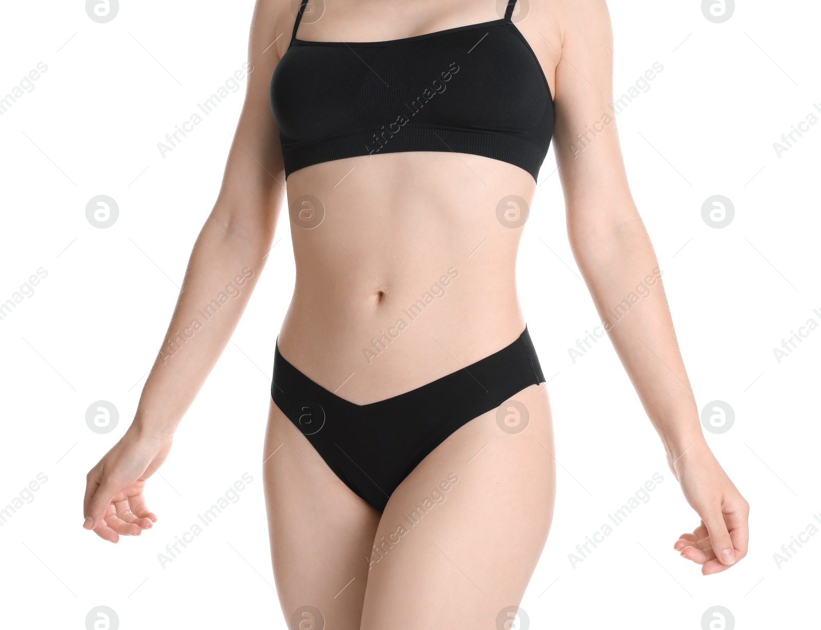 Photo of Woman with slim body posing on white background, closeup