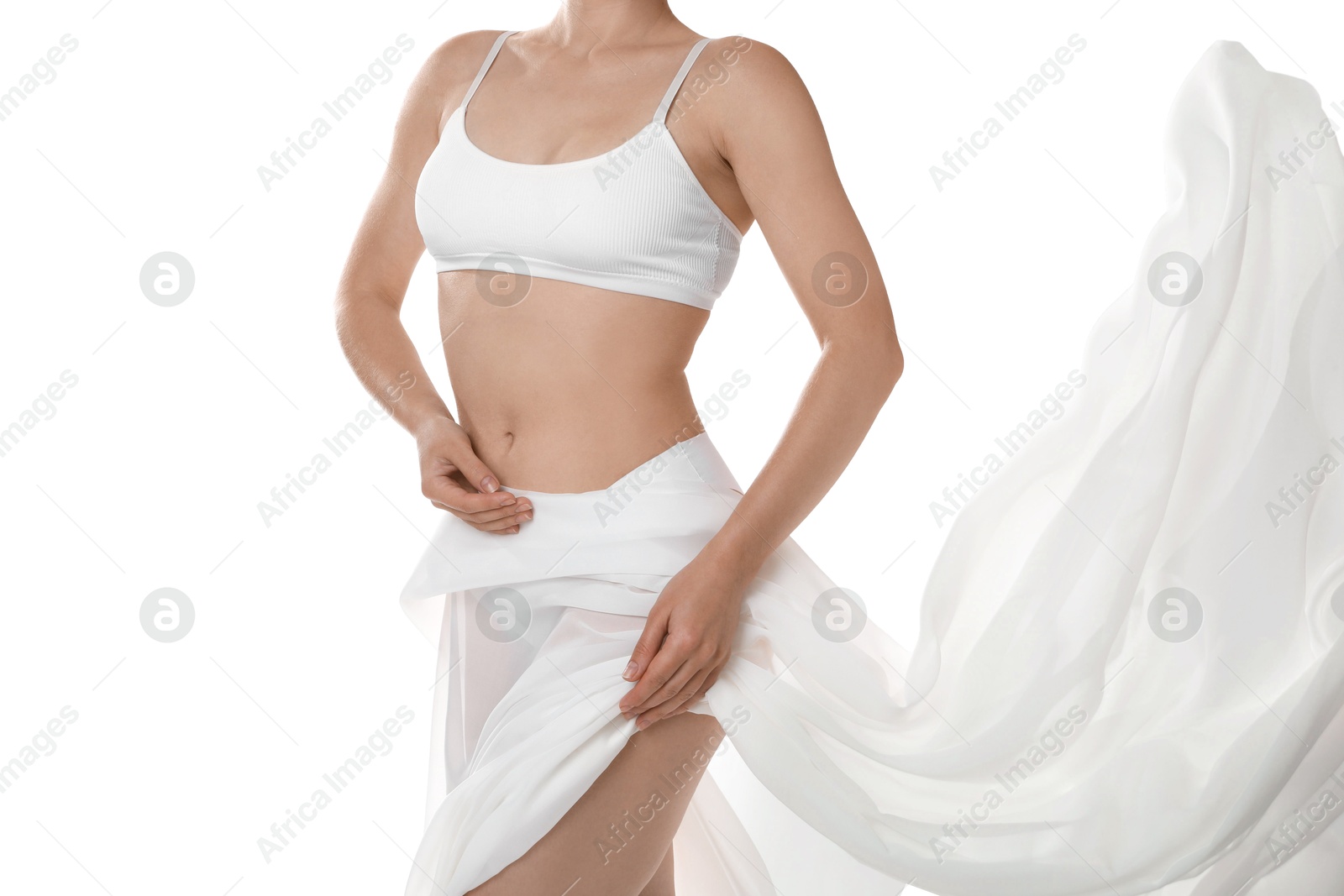 Photo of Woman covering her slim body with silk fabric against white background, closeup