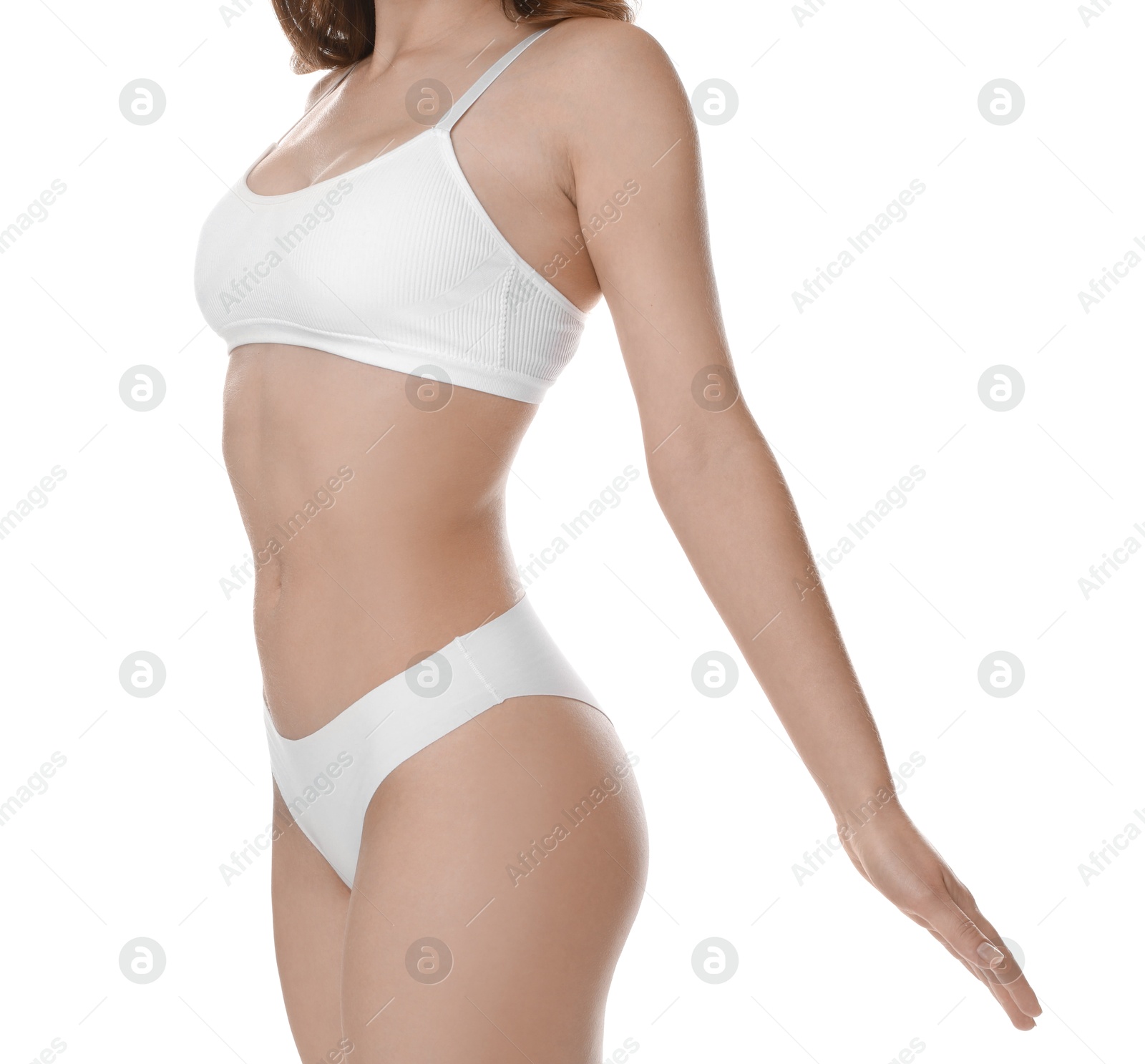 Photo of Woman with slim body posing on white background, closeup