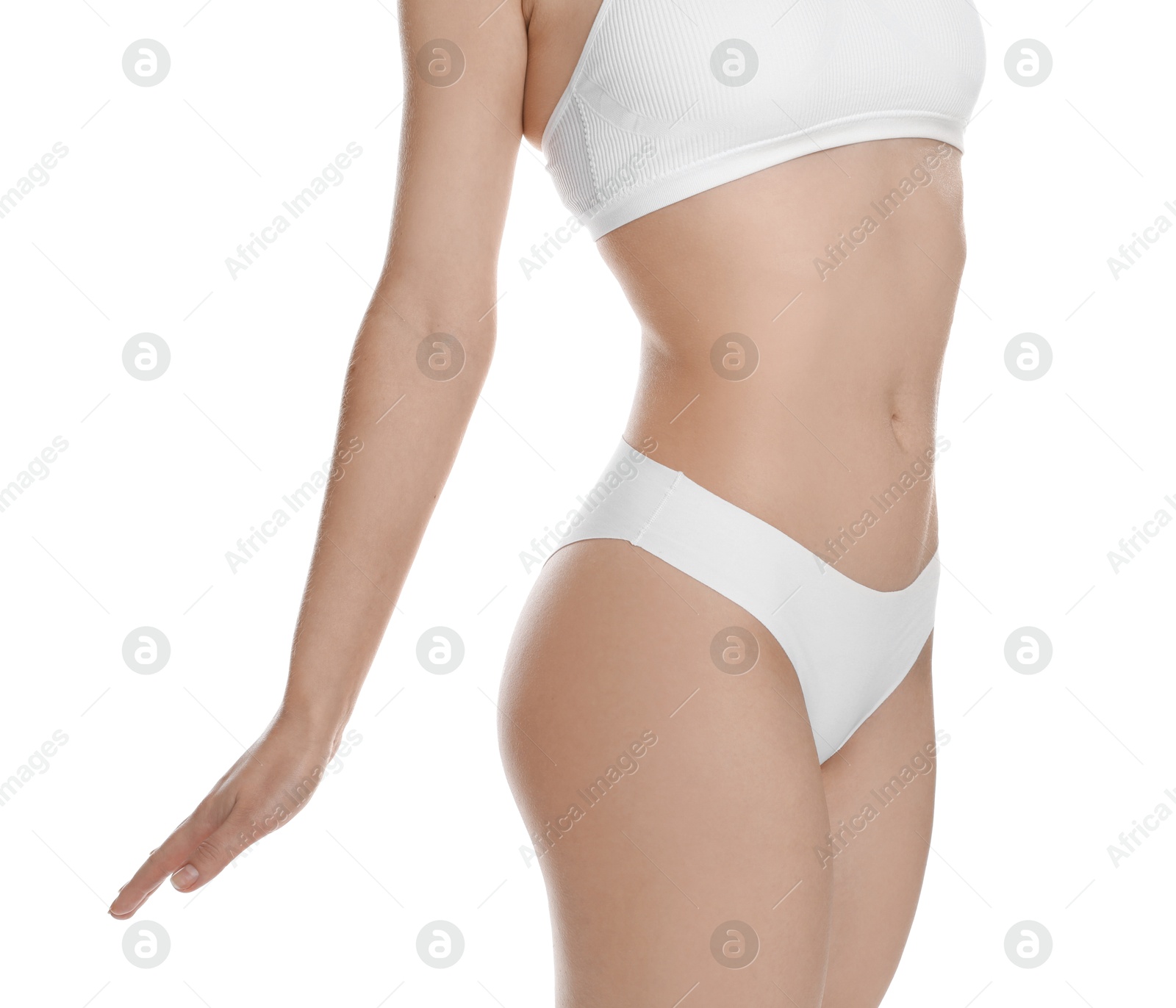 Photo of Woman with slim body posing on white background, closeup