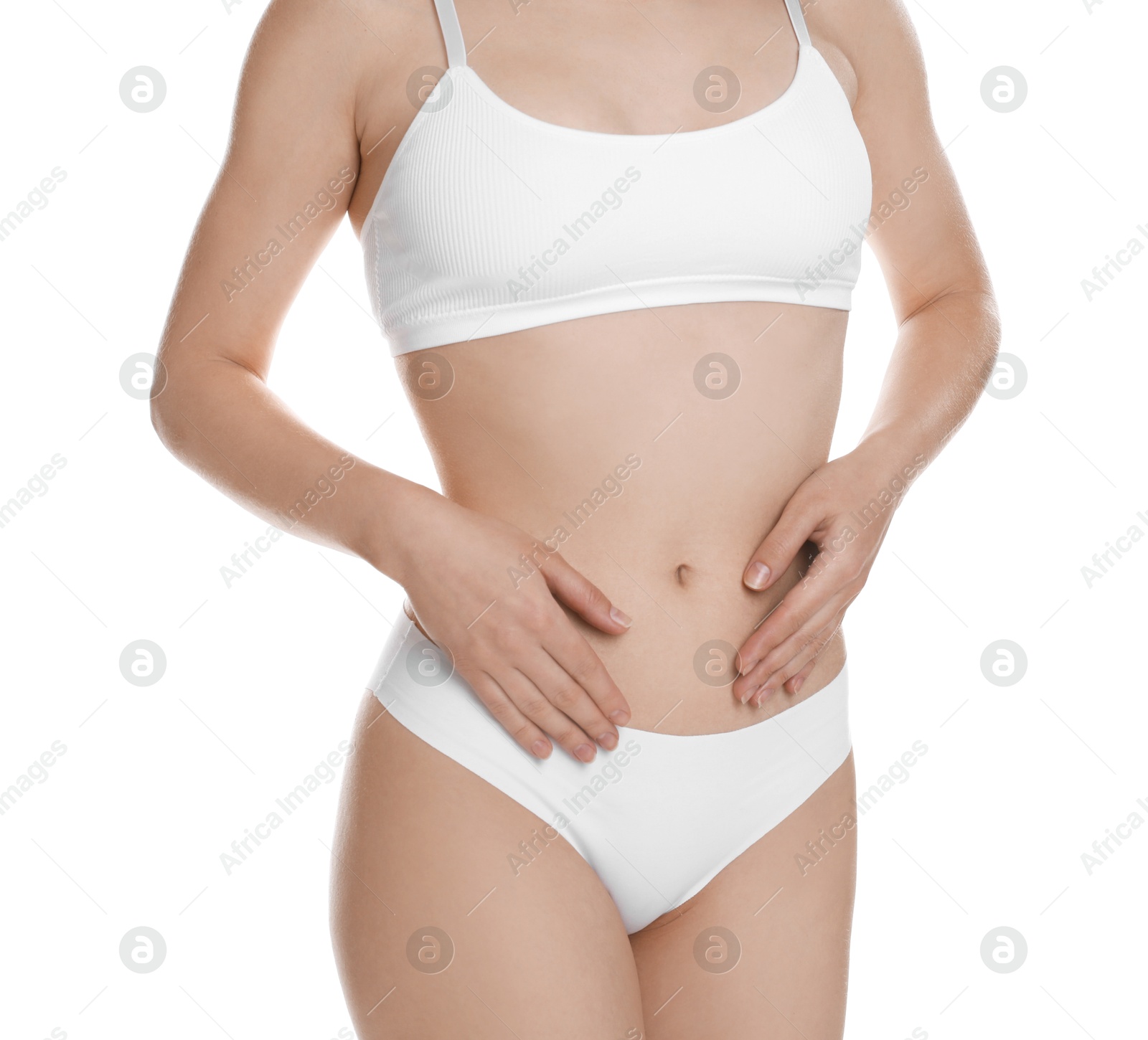 Photo of Woman with slim body posing on white background, closeup