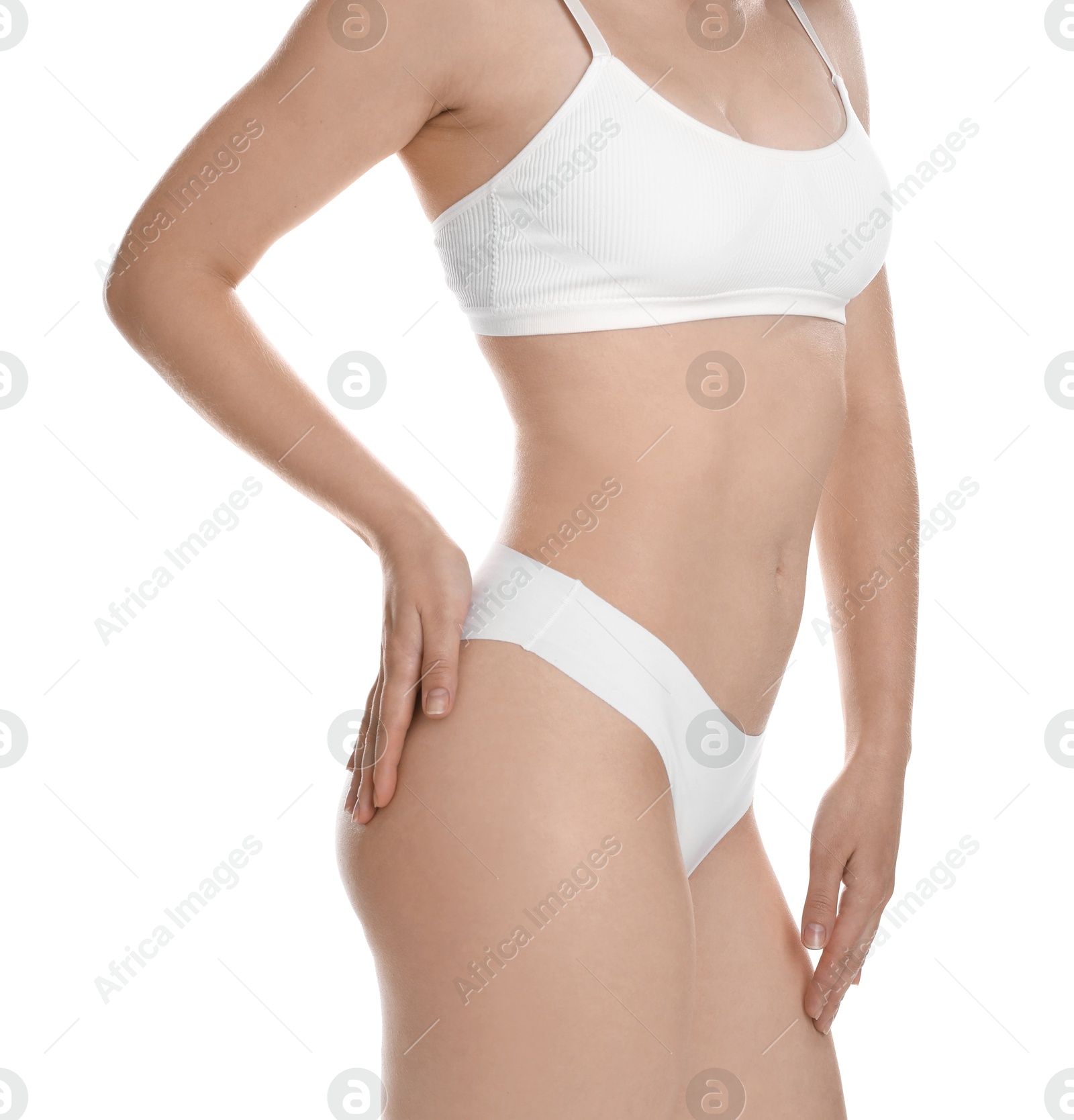 Photo of Woman with slim body posing on white background, closeup