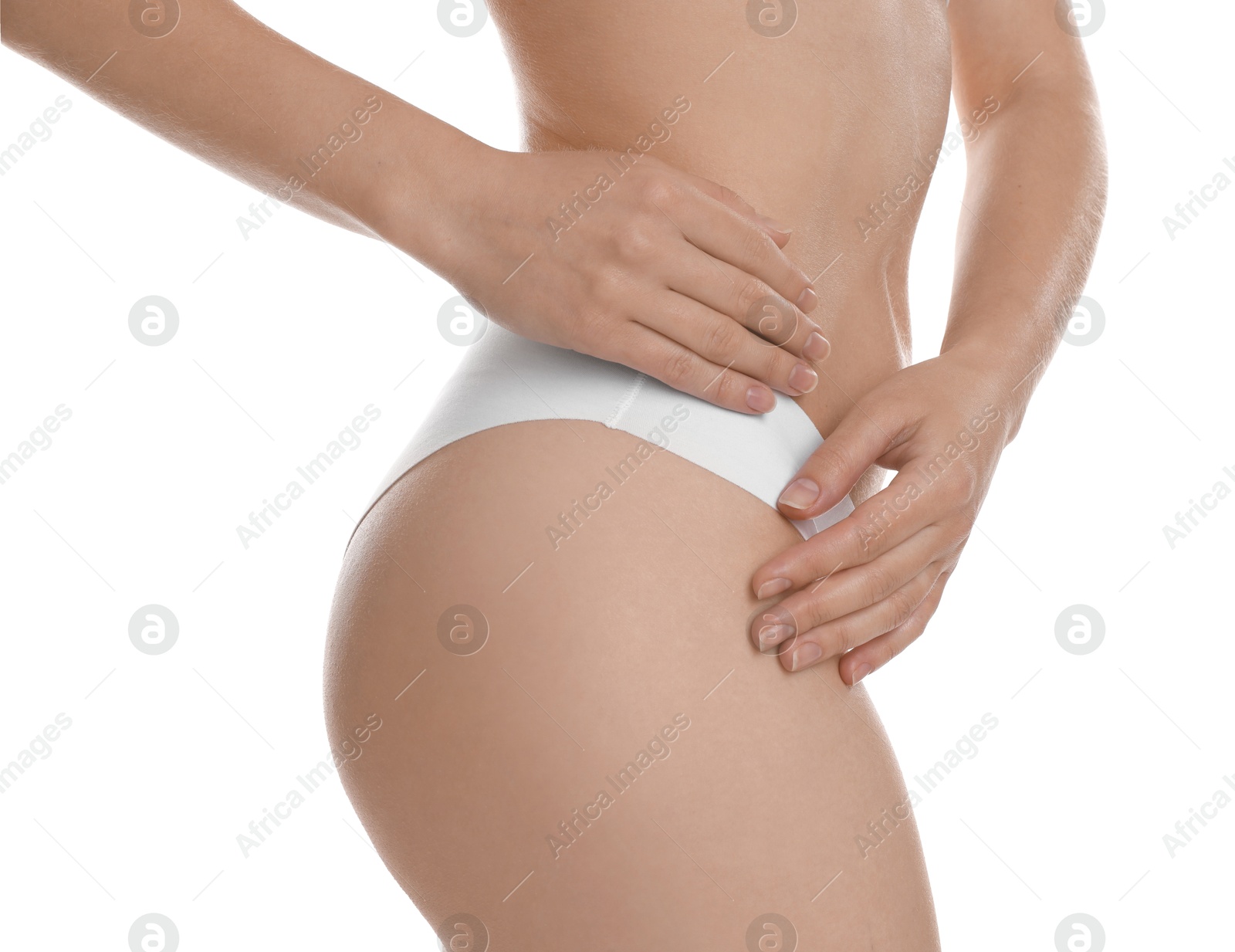 Photo of Woman with slim body posing on white background, closeup