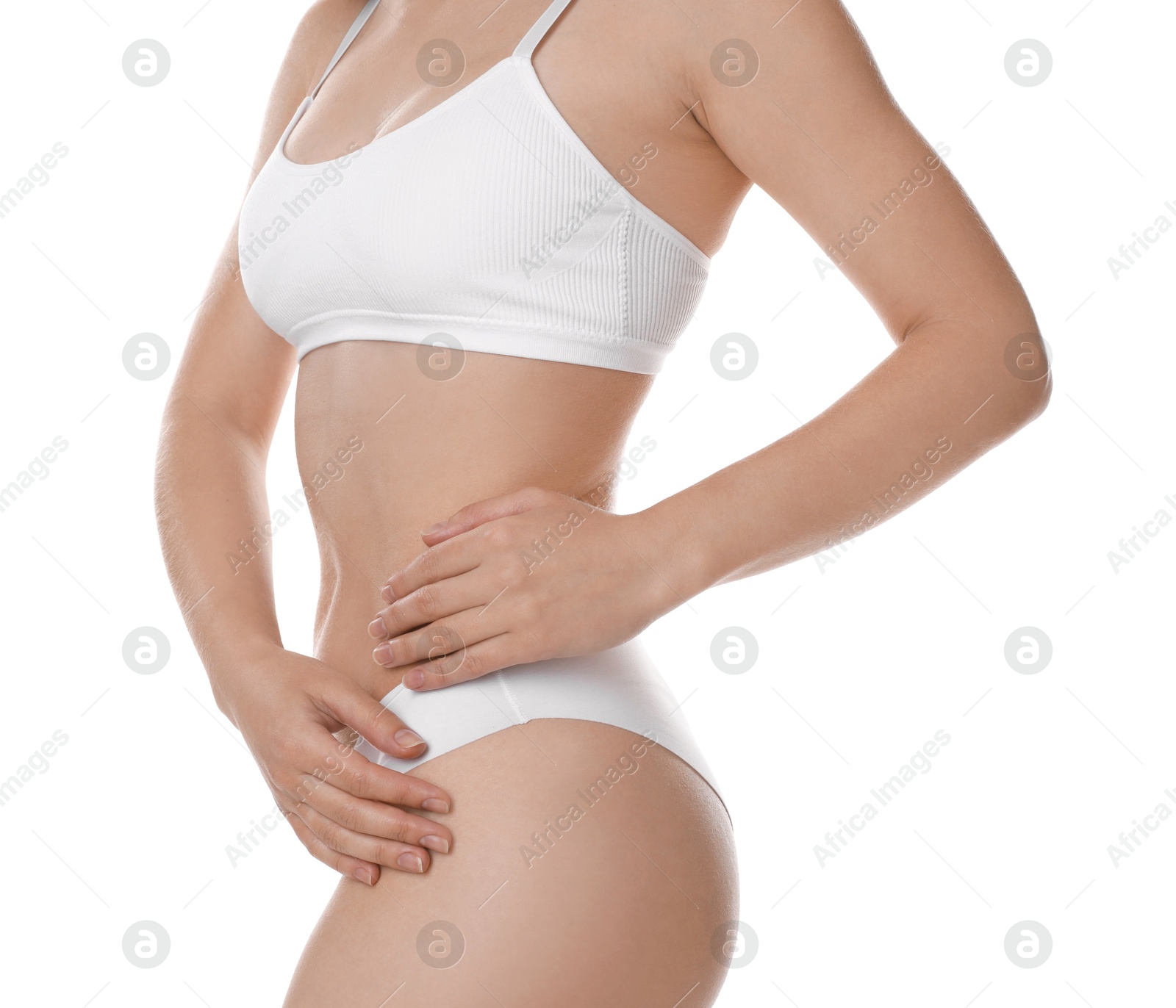 Photo of Woman with slim body posing on white background, closeup