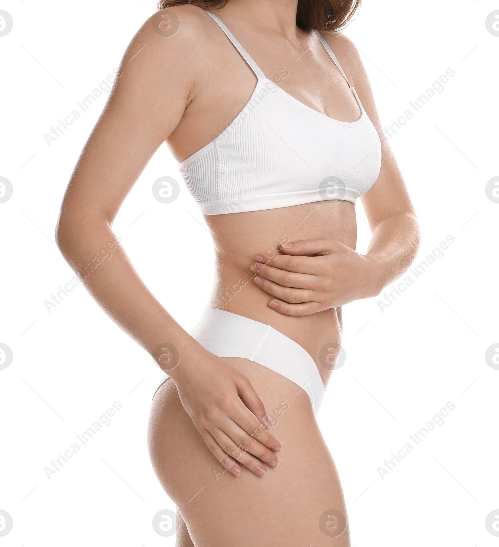 Photo of Woman with slim body posing on white background, closeup