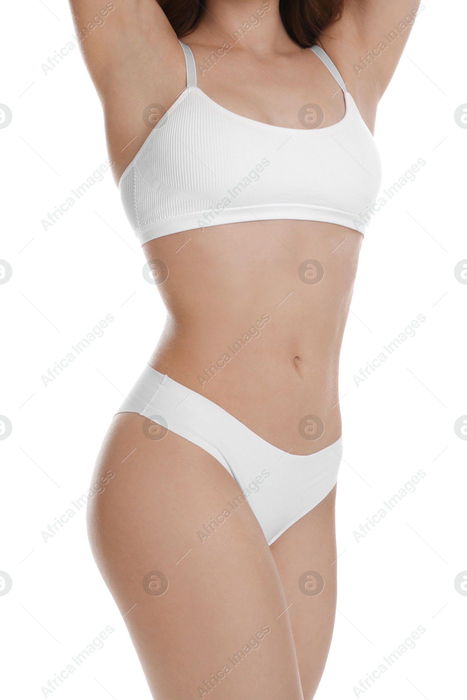 Photo of Woman with slim body posing on white background, closeup