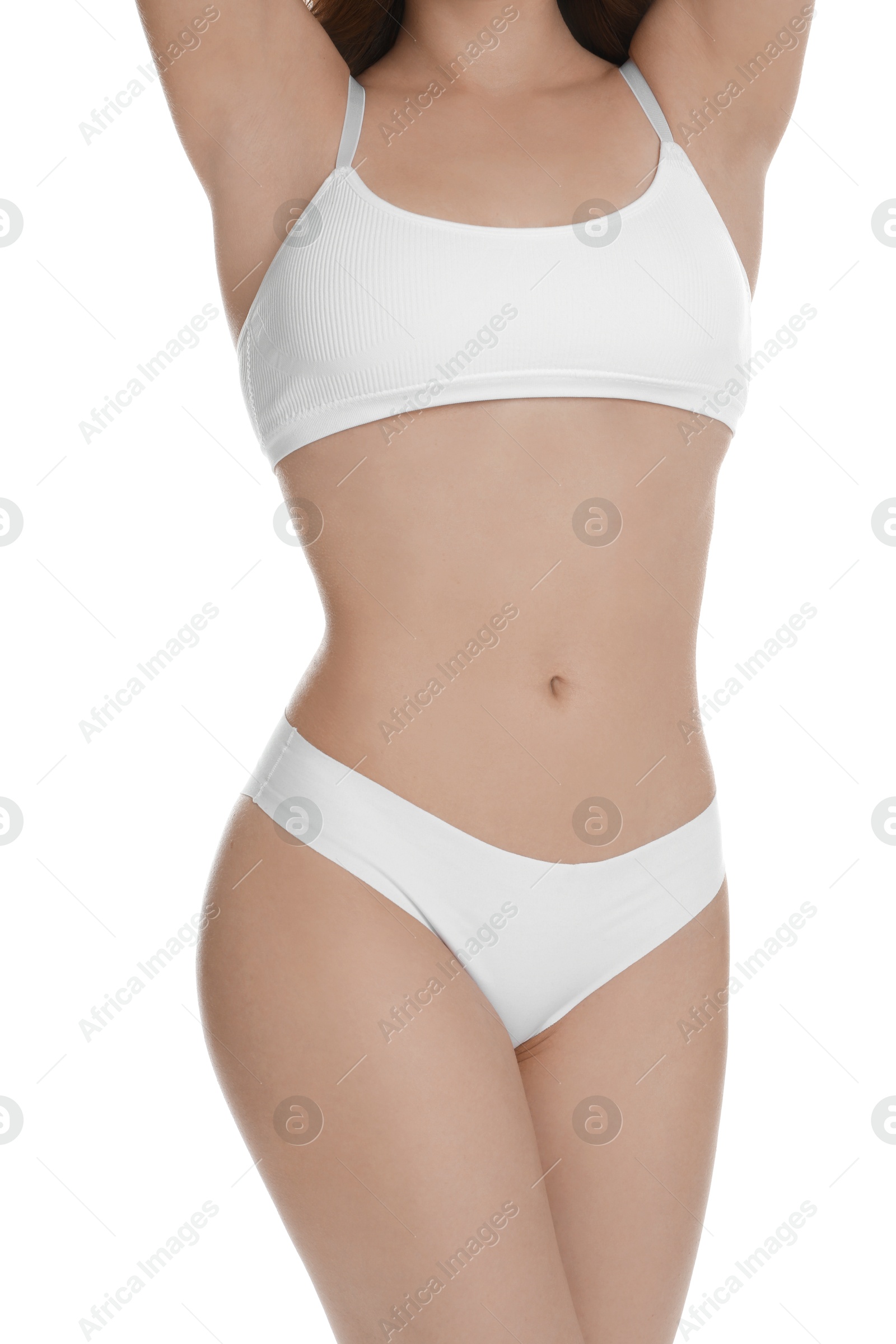 Photo of Woman with slim body posing on white background, closeup