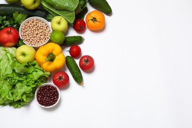 Photo of Healthy vegetarian food. Different vegetables, lentils and fruits on white background, flat lay. Space for text