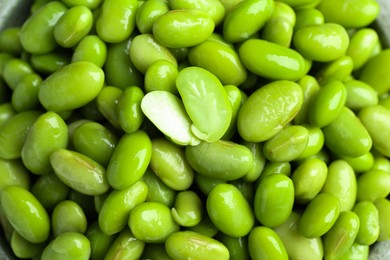 Fresh edamame soybeans as background, above view