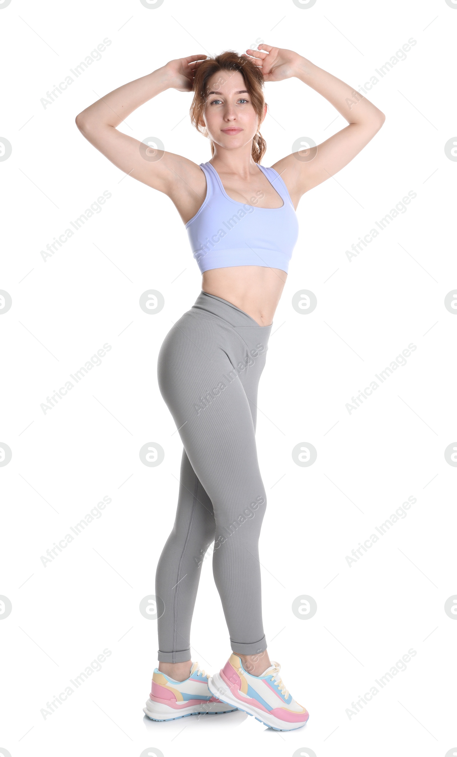 Photo of Woman with slim body posing on white background