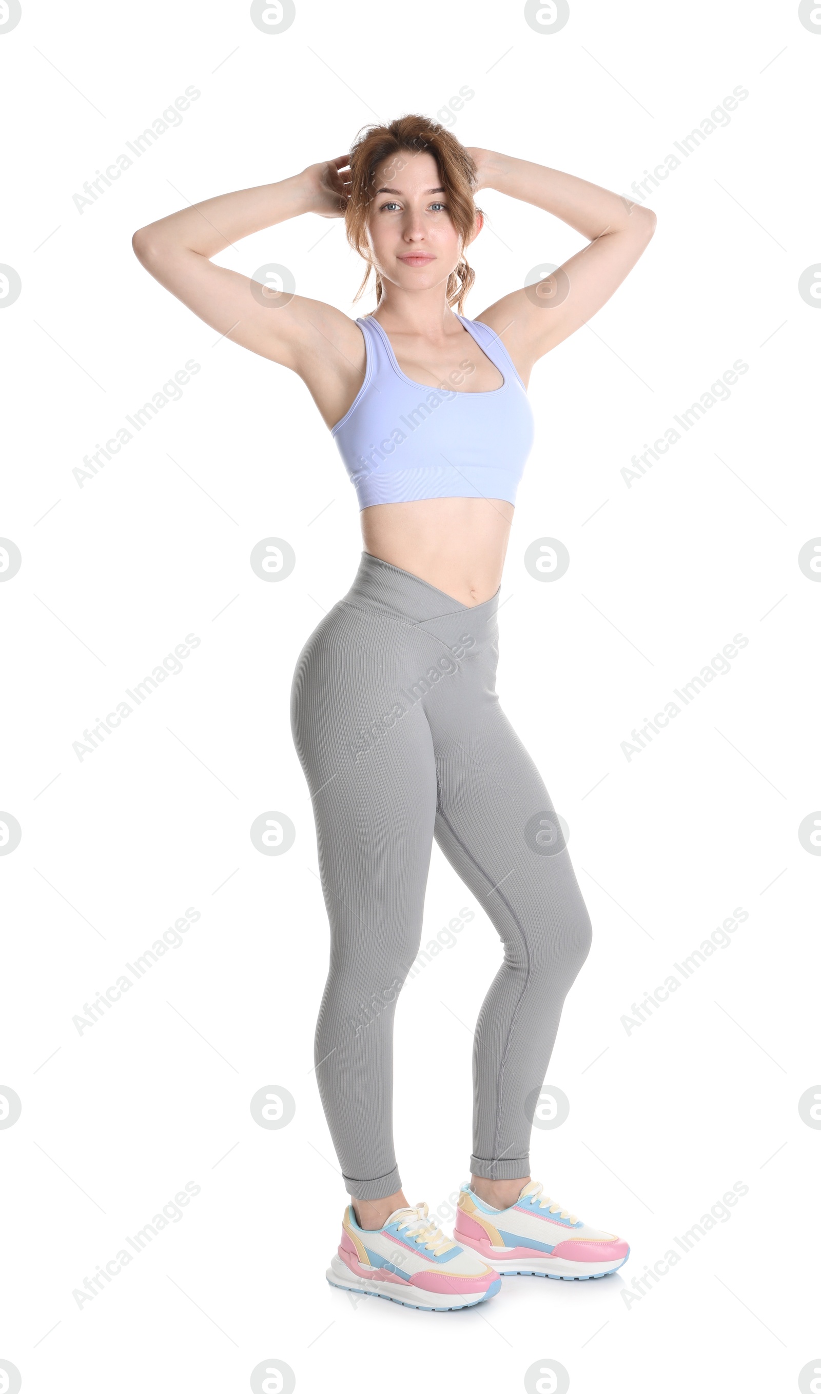 Photo of Woman with slim body posing on white background