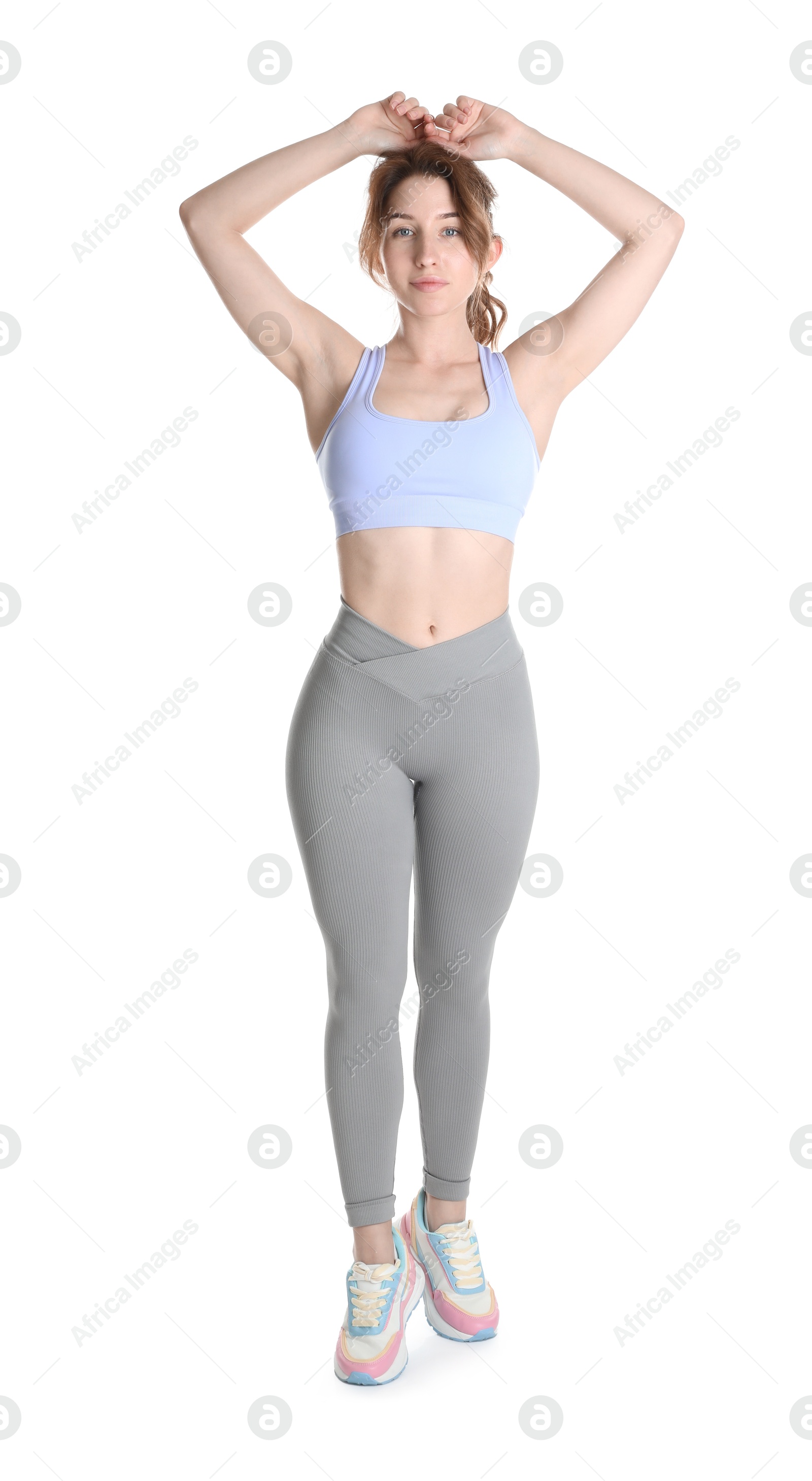 Photo of Woman with slim body posing on white background