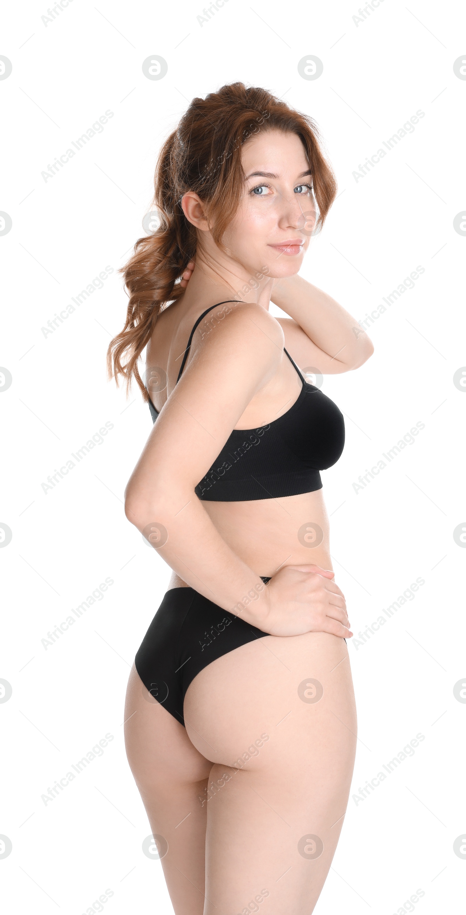 Photo of Woman with slim body posing on white background