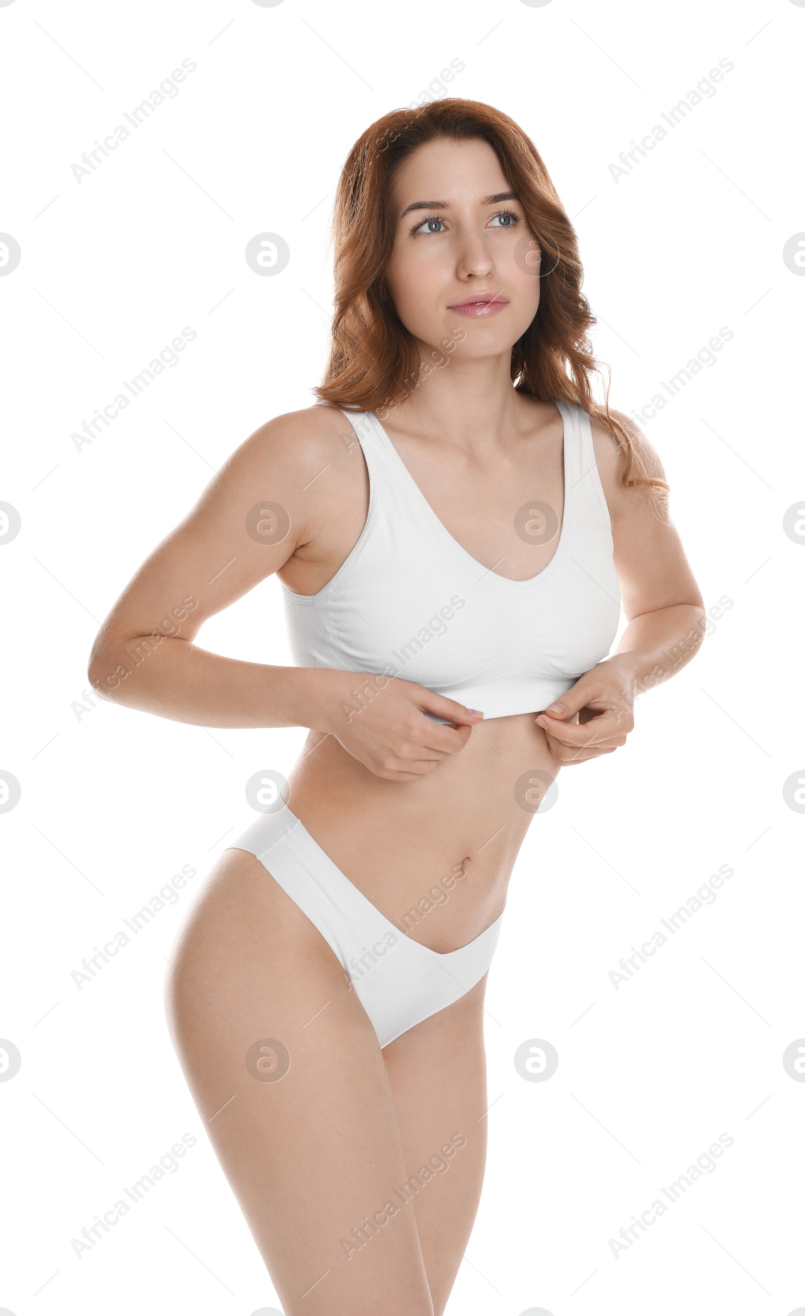 Photo of Woman with slim body posing on white background