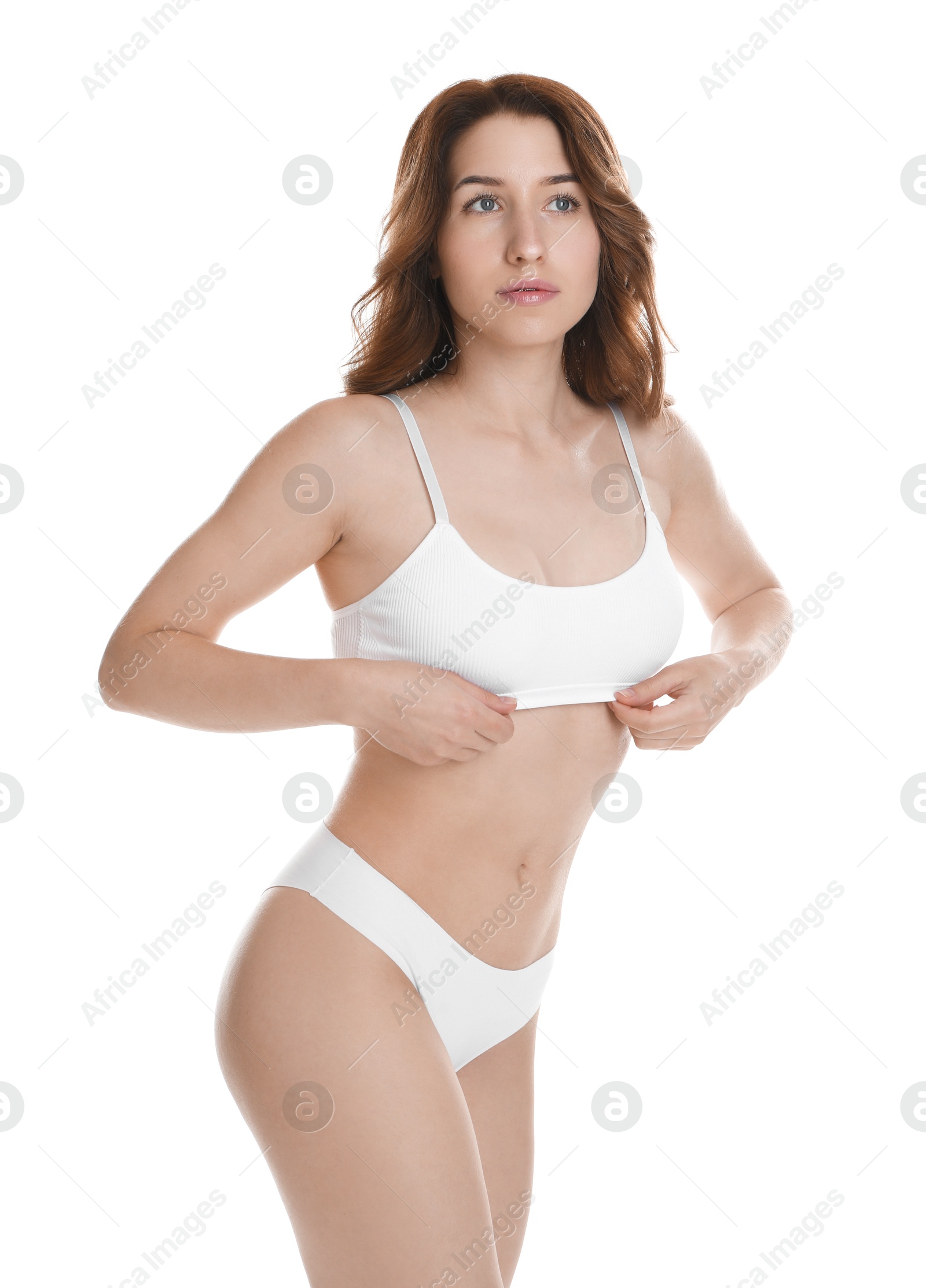 Photo of Woman with slim body posing on white background