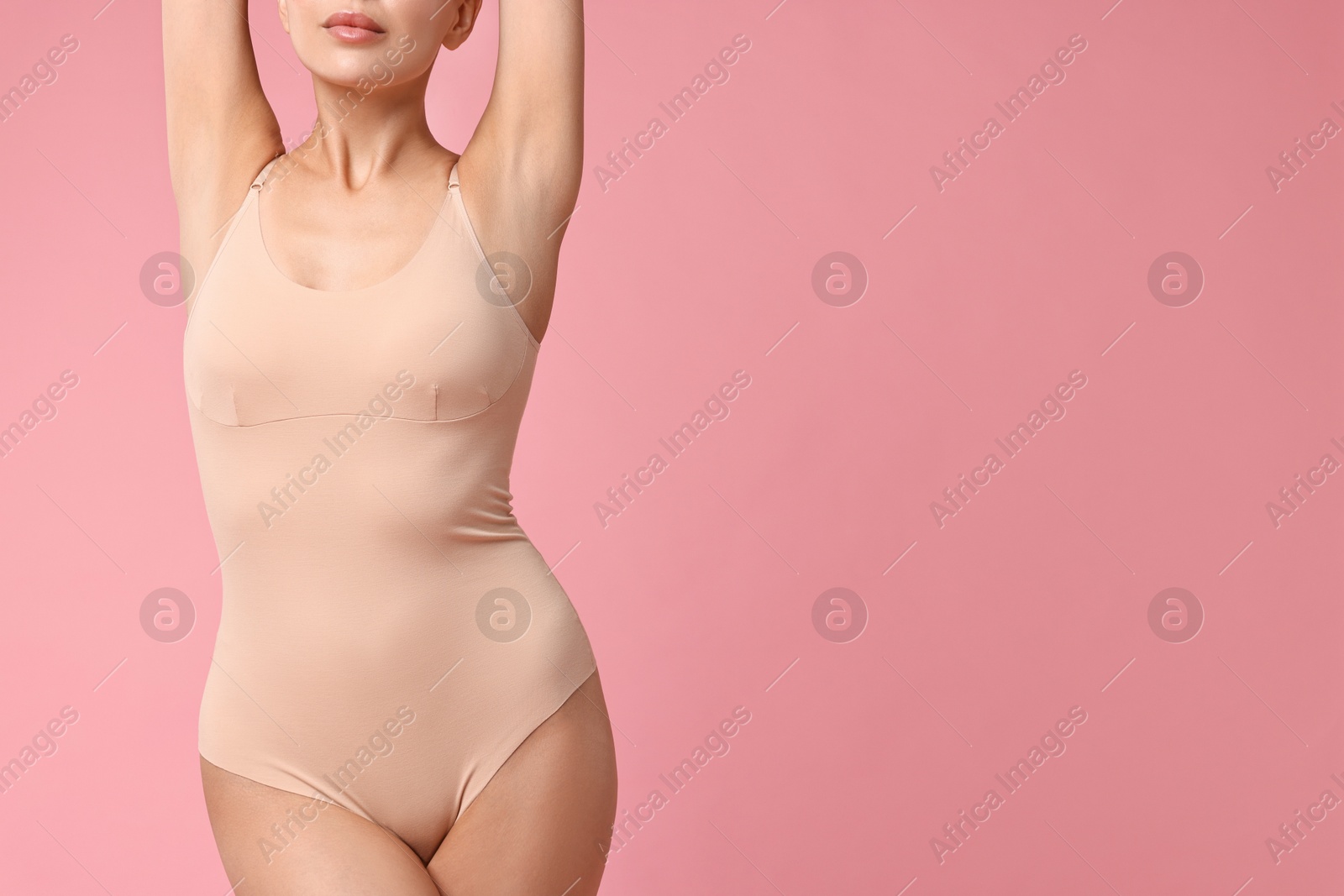 Photo of Woman with perfect skin on pink background, closeup and space for text. Body care