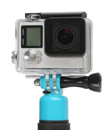 Modern action camera and monopod isolated on white