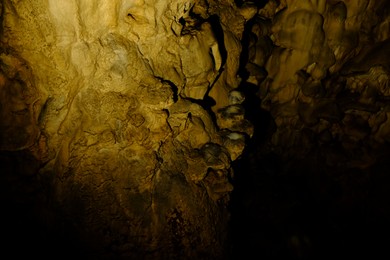 View of rock formations in dark cave