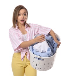 Photo of Young housewife with basket full of laundry on white background