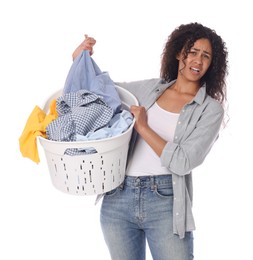 Displeased woman with basket full of laundry on white background