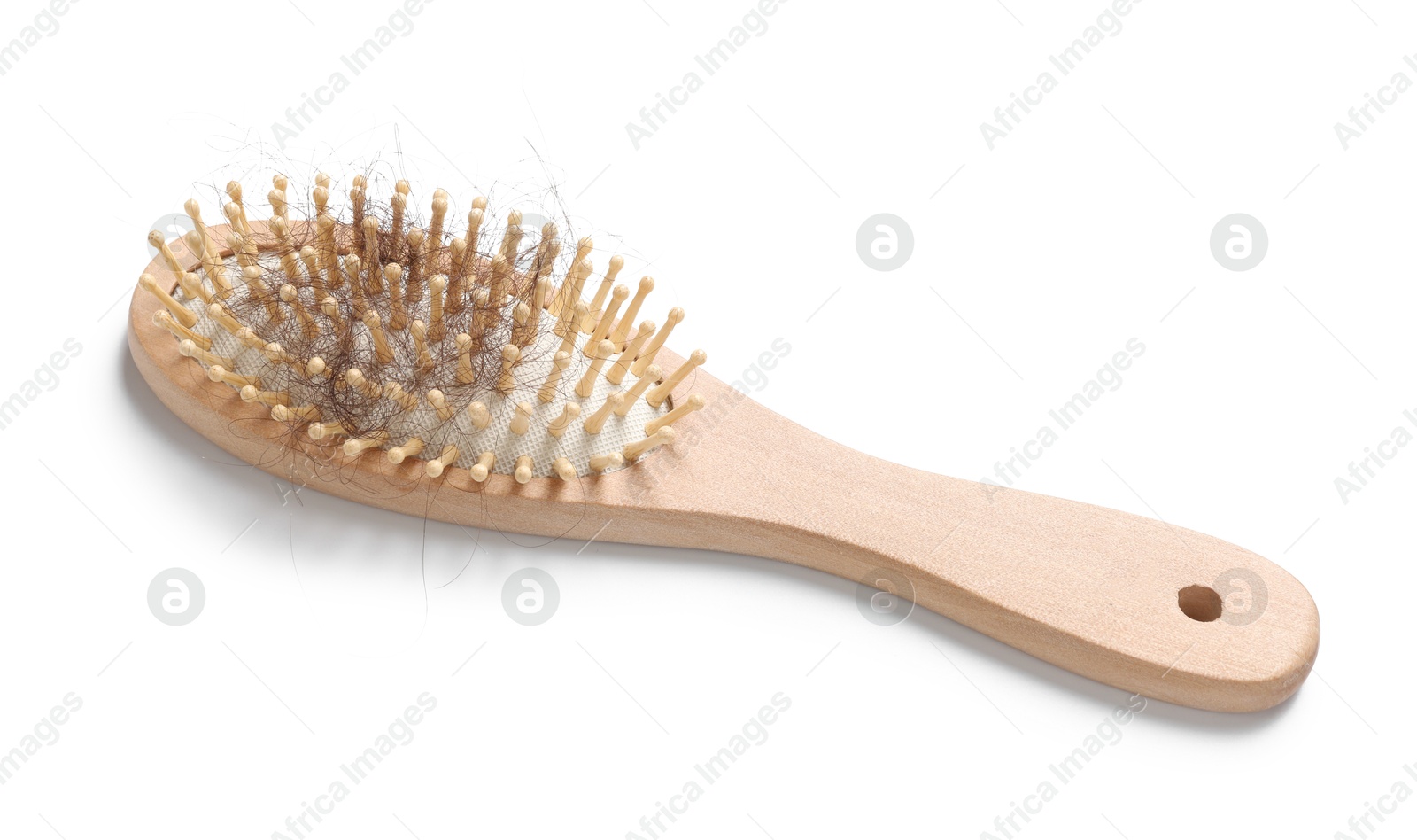 Photo of One brush with lost hair isolated on white