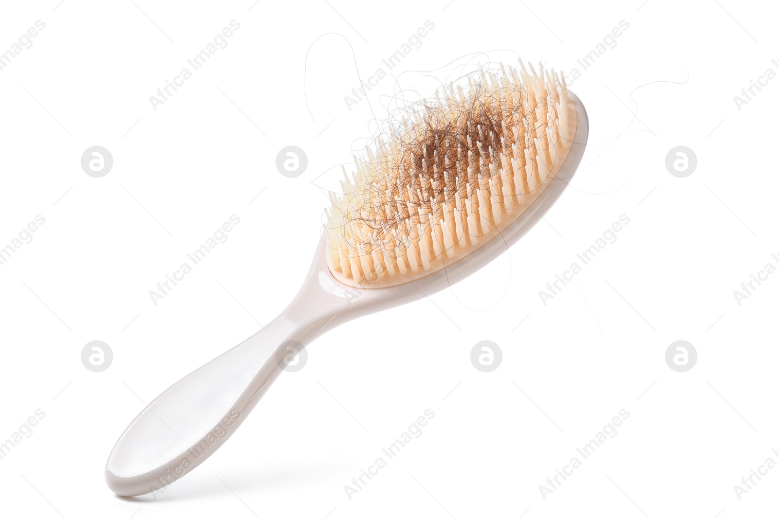 Photo of One brush with lost hair isolated on white