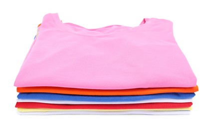 Photo of Stack of colorful clothes isolated on white