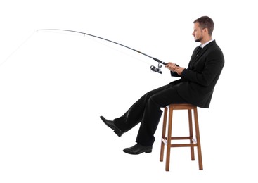 Businessman with rod fishing on chair against white background