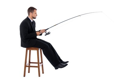 Businessman with rod fishing on chair against white background