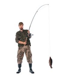 Fisherman with rod and caught fish isolated on white