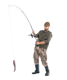 Fisherman with rod and caught fish isolated on white