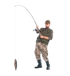 Photo of Emotional fisherman with rod and caught fish isolated on white