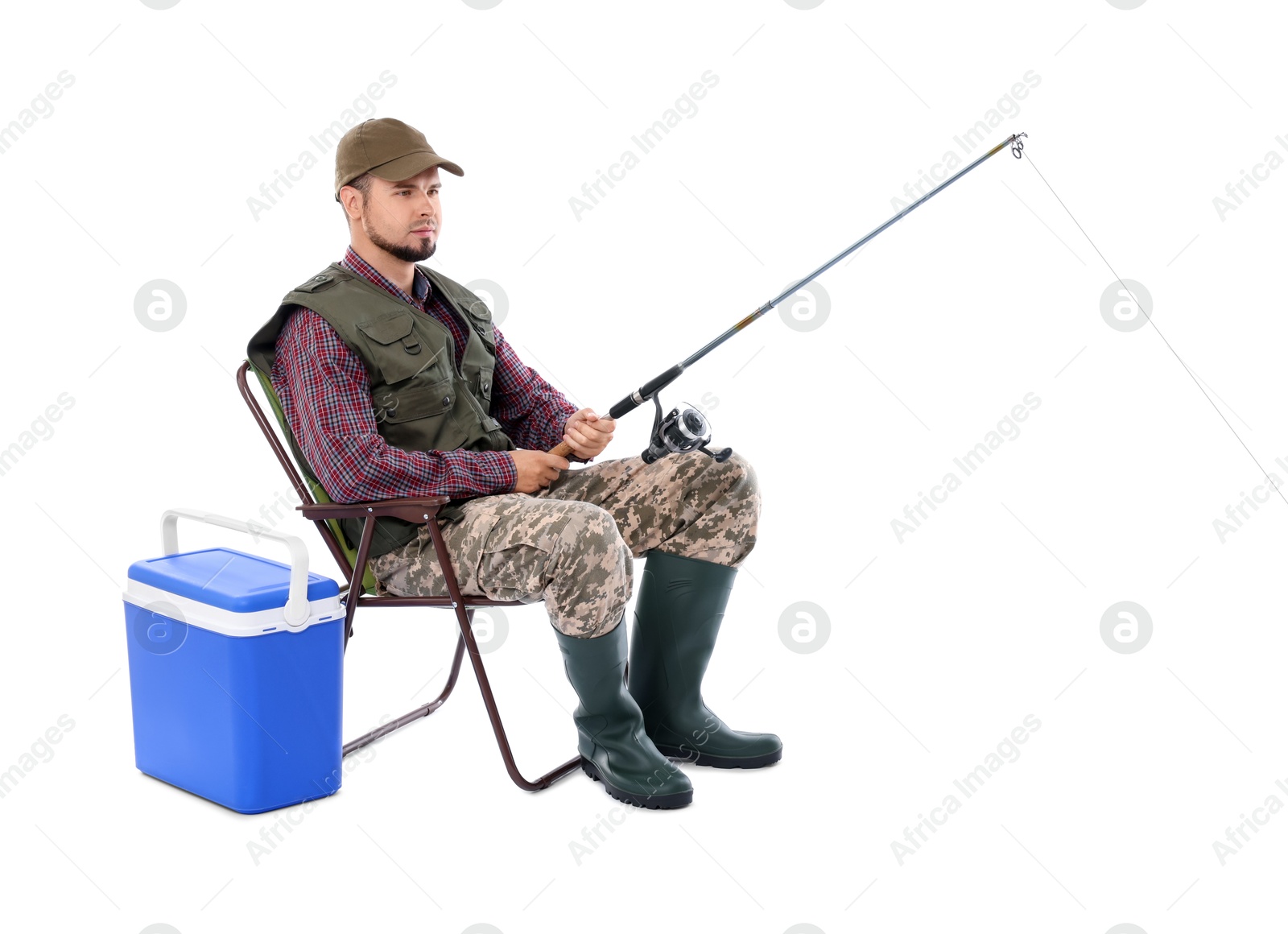 Photo of Fisherman with rod and cooler box fishing on chair against white background