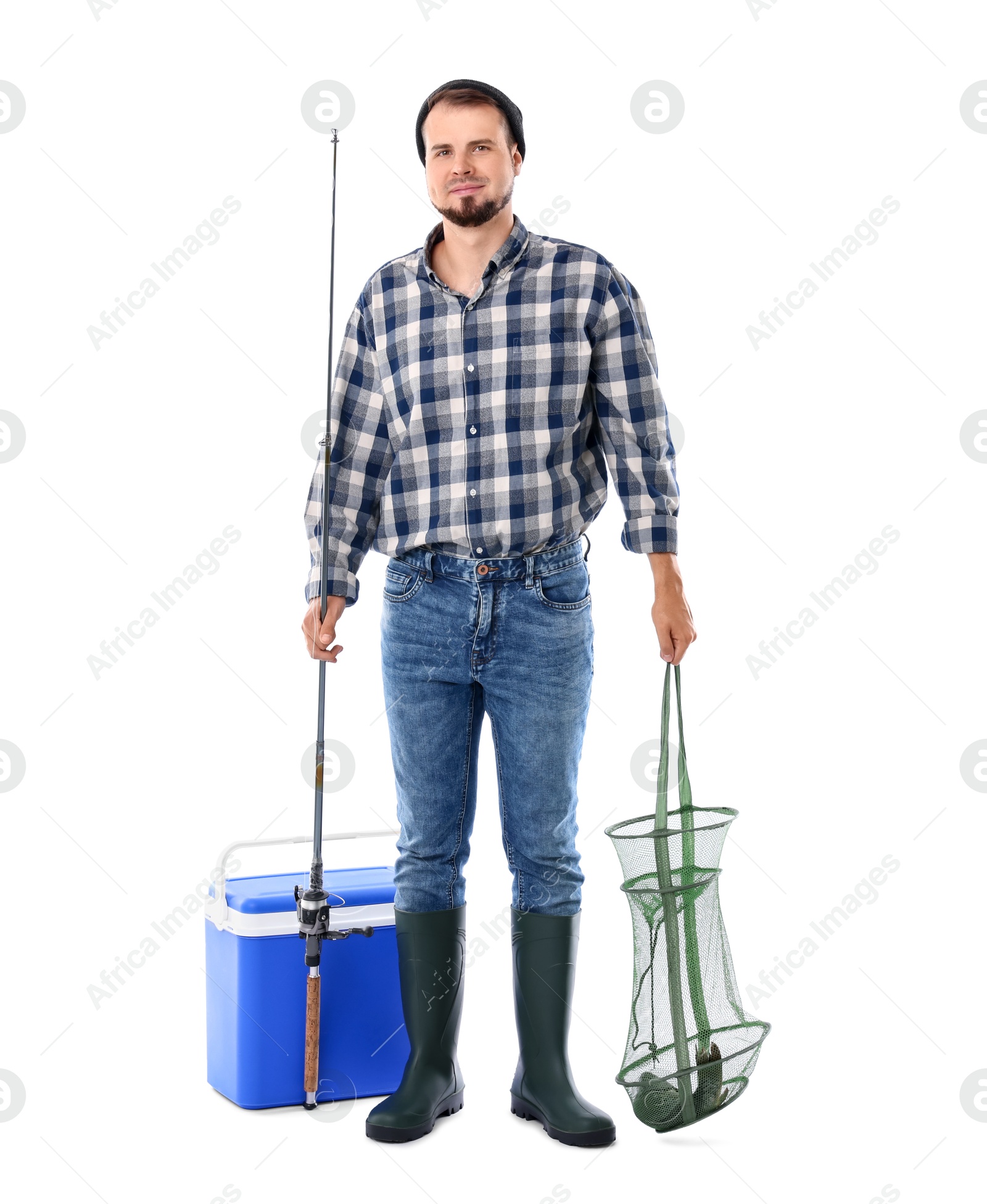 Photo of Fisherman with rod, cooler box and caught fish in net isolated on white