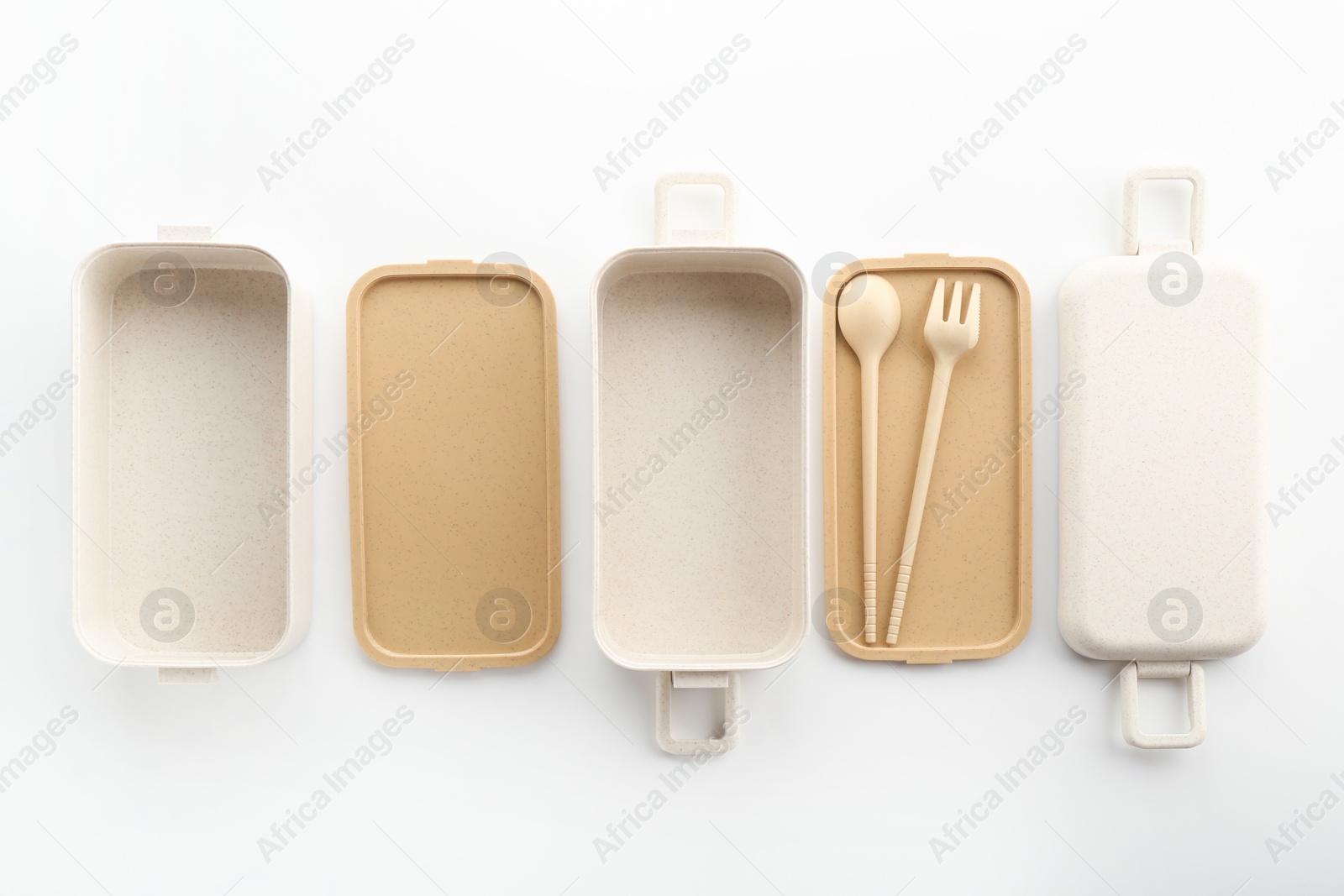 Photo of Plastic lunch boxes and cutlery isolated on white, top view