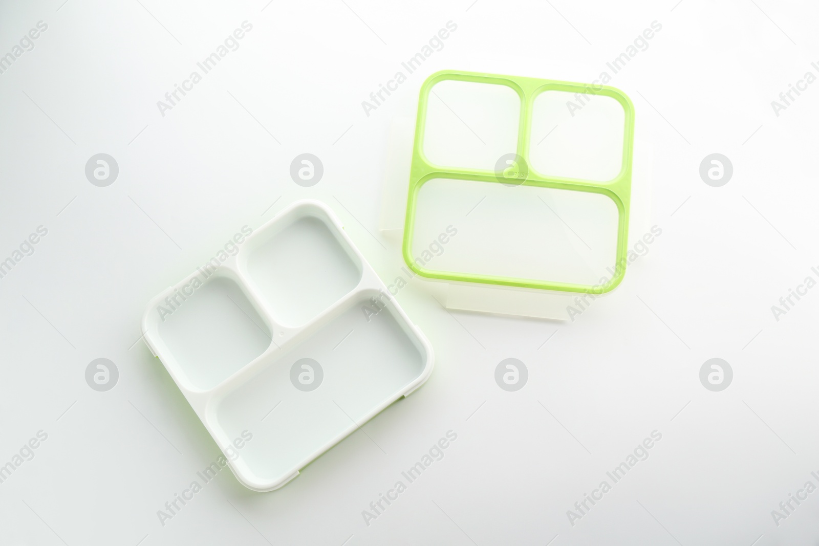 Photo of Plastic lunch box and lid isolated on white, top view