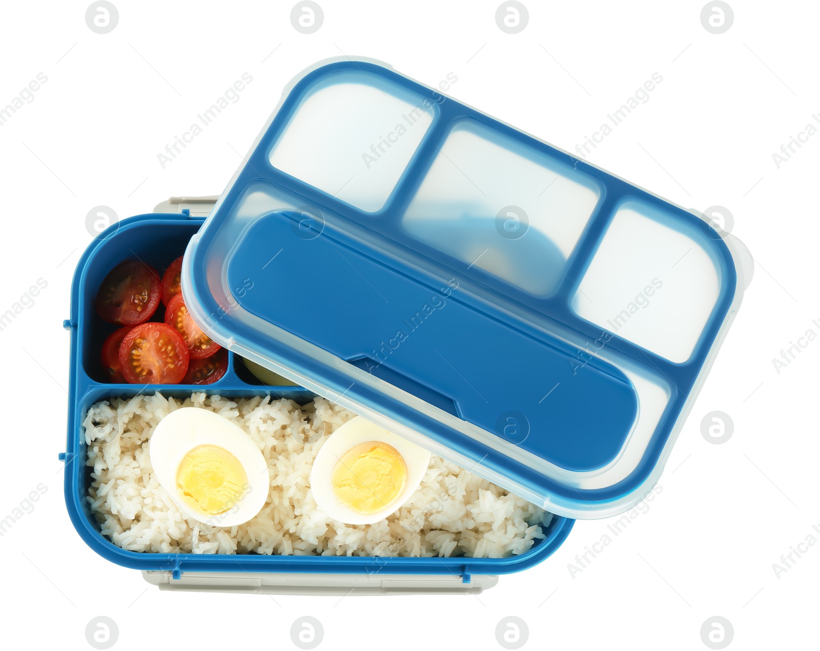 Photo of Lunch box with rice, fruits, tomatoes and egg halves isolated on white, top view