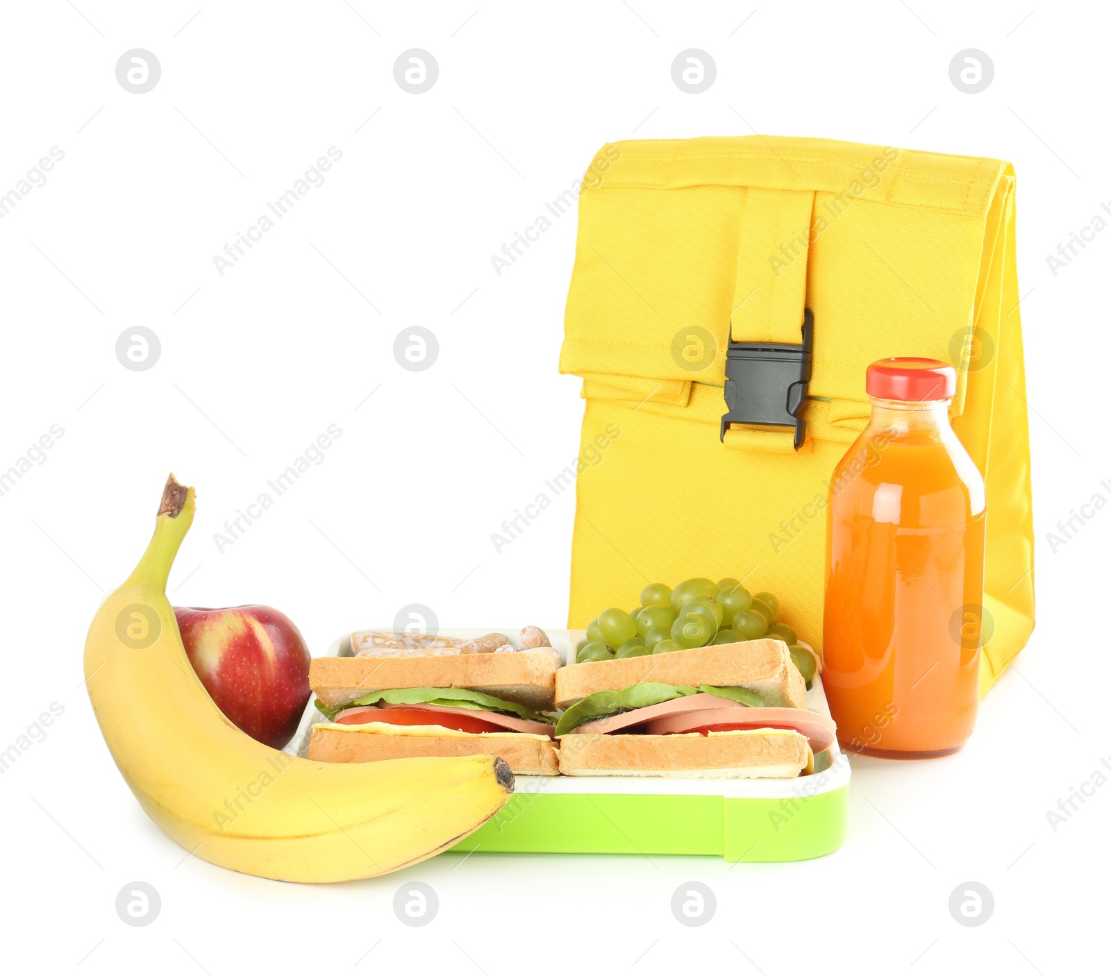 Photo of Yellow bag, lunch box with snacks and bottle of juice isolated on white