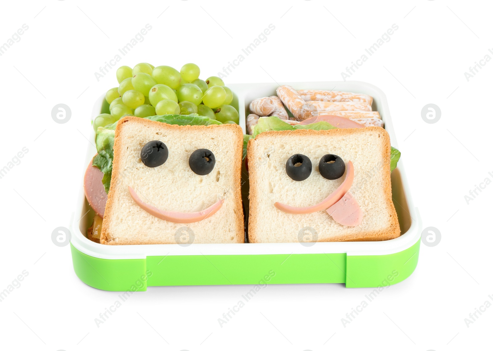 Photo of Sandwiches with smiley faces, grapes and cookies in lunch box isolated on white