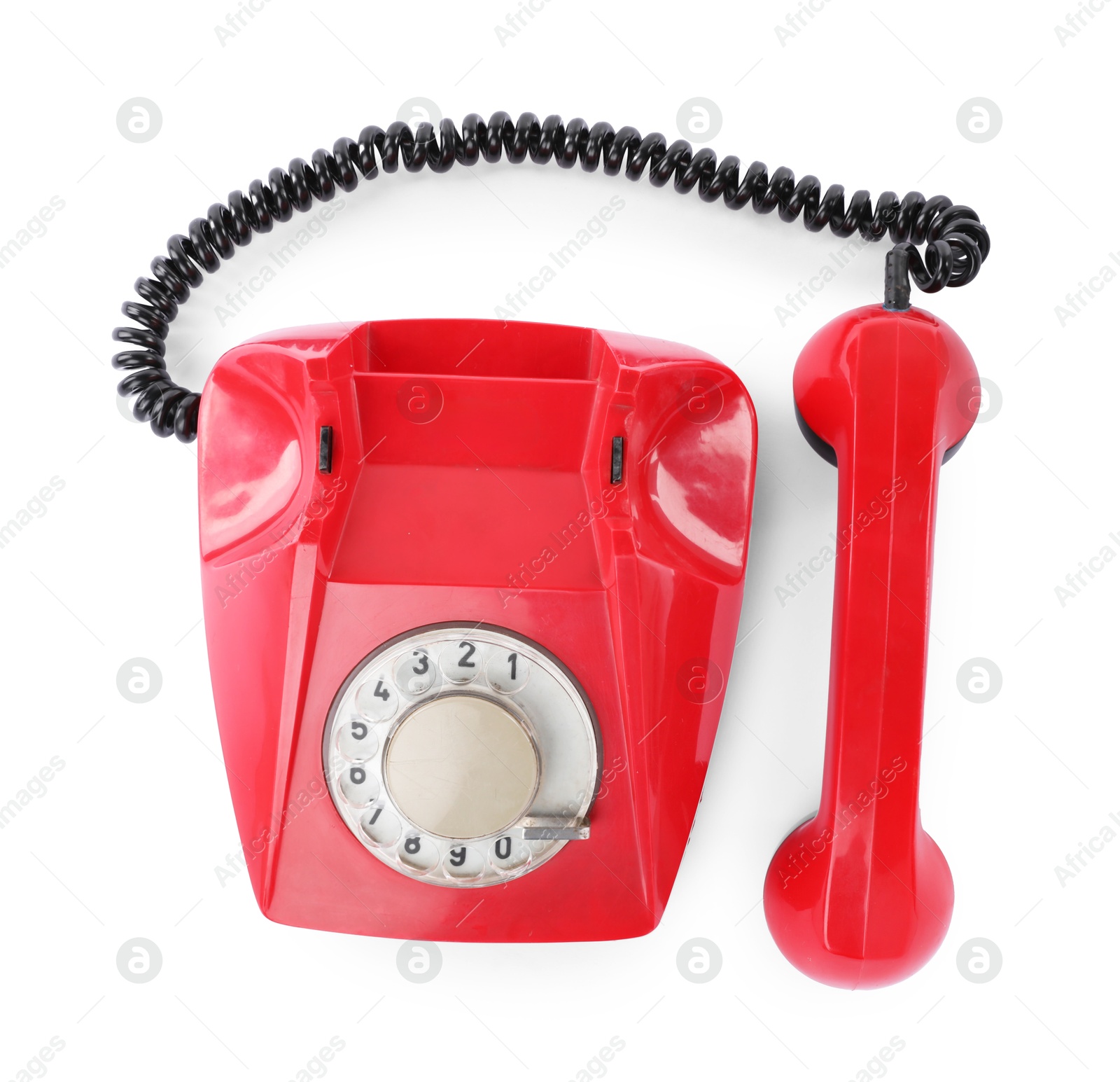 Photo of One red telephone with handset isolated on white, top view