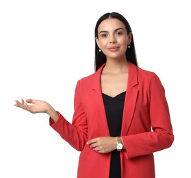 Photo of Beautiful woman in red jacket and black dress showing something on white background