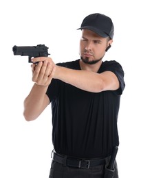 Young bodyguard using gun on white background